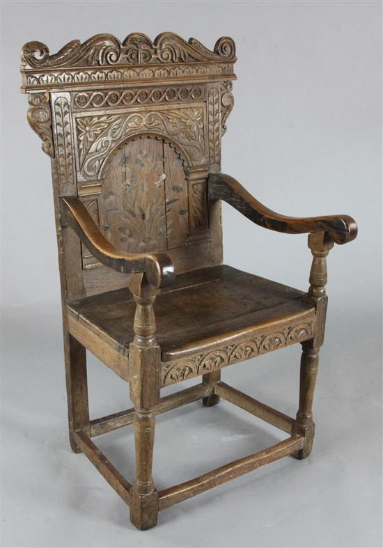 A 17th century oak Wainscot chair, W.2ft 2in. H.3ft 8in. incorporating later timbers